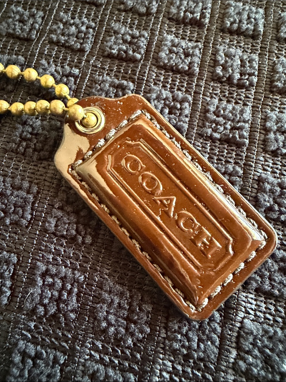 Coach Brown Leather Logo Tag with Gold Ball Chain